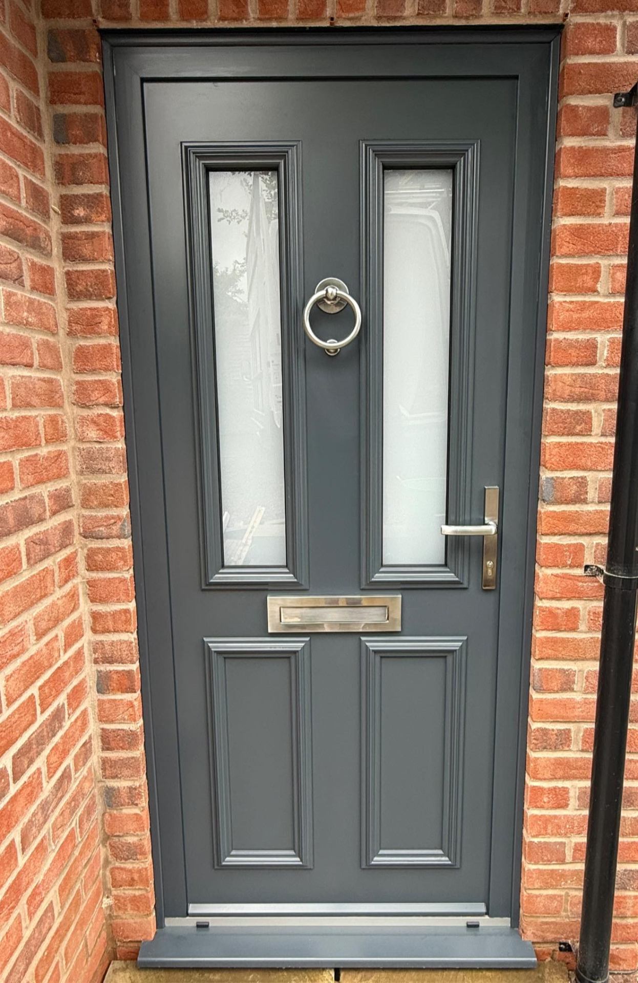 Anthracite composite front door installation, Shropshire