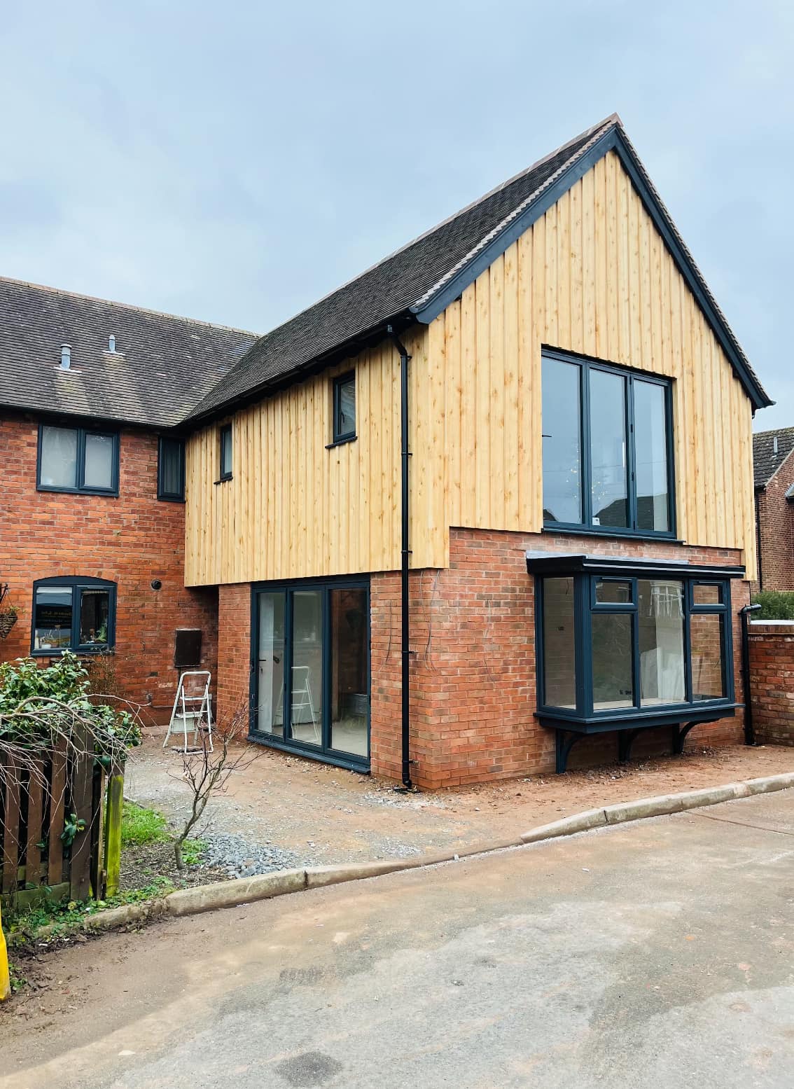 Anthracite aluminium windows and bay across a contemporary Shropshire new build